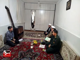 تجلیل از خواهر بسیجی «خانم برجی» بعنوان چهره قرآنی و فرمانده حوزه بسیج شهر آبگرم