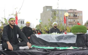 پیکر مطهر یک شهید گمنام در حوزه علمیه ملایر آرام گرفت