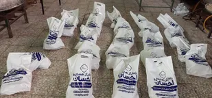 ۱۸۰۰ بسته گوشت مرغ یخ&zwnj;زده در گرمسار توزیع شد+تصاویر