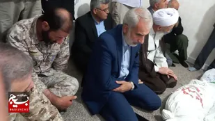 مسئولان ارشد مازندران در کنار پیکر های مطهر شهدای تازه تفحص شده در مناطق شمالغرب کشور