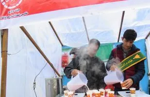 خدمات رسانی خادمین شهدا استان کرمانشاه در راهپیمایی 22 بهمن +عکس