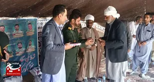 تجلیل از خانواده شهید ابراهیمی در بخش گوهرکوه تفتان&nbsp;