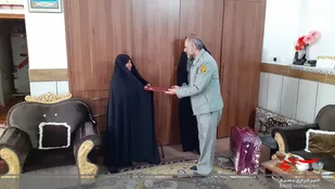 دیدار مسئولین سازمان محیط زیست استان و شاهرود با خانواده شهید عامری