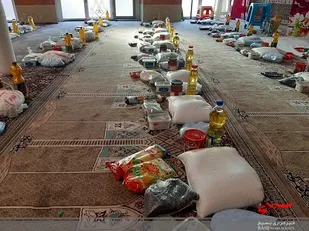 100بسته کمک مومنانه به یاد و نام شهدای کوی امامیه در منطقه رجائی شهر توزیع شد