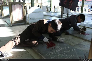 بازنویسی قبور شهدا توسط بسیج هنرمندان بخش خواهران شهرستان مبارکه
