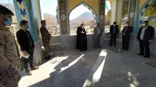 عطر افشانی قبور شهدای بخش منج لردگان