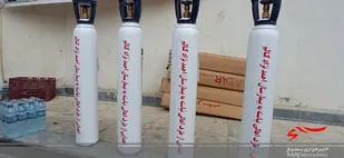 عطر افشانی متفاوت مزار شهدا در رامسر&zwnj;+ تصاویر