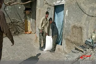 توزیع آرد رایگان در بخش مرکزی شهرستان هیرمند