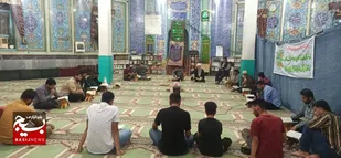 برپایی محفل انس با قرآن توسط بسیجیان گردان امام حسین (ع) بندر امام خمینی(ره)