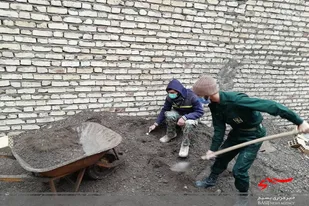 ساخت خانه معسر توسط بسیجیان کاشمری