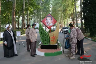 آیین رونمایی از یادمان شهید رجایی در اردوگاه شهید رجایی محمد شهر کرج