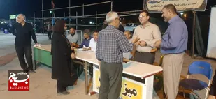 برگزاری میز خدمت جهادی شهرداری هندیجان به یادشهدای مدافع وطن
