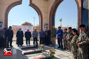 عطرافشانی گلزار مطهر شهدابه مناسبت هفته بسیج در قهاوند