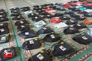 رزمایش اهداء و توزیع ۱۰۰۰ بسته کیف و نوشت&zwnj;افزار بین دانش&zwnj;آموزان نیازمند در فامنین