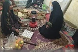 عیادت و دلجویی ازیک بانوی محله ابوذر زاهدان