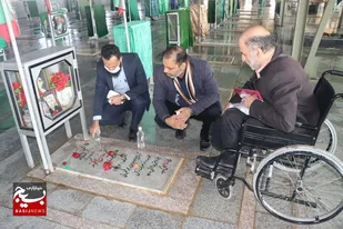 مزار و یادباد دو خبرنگار شهید شهرستان شوش غبار روبی شد