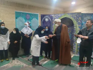 تجلیل از بانوان کادر بهداشت و درمان در آمل