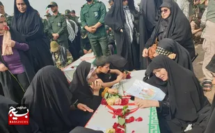 بازگشت پیکر ۷۱ شهید گلگون کفن از مرز شلمچه به کشور+فیلم
