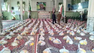 تهیه و اهدای ۳۱۵ بسته مواد غذایی به خانواده مددجویان نیازمند تربت جام