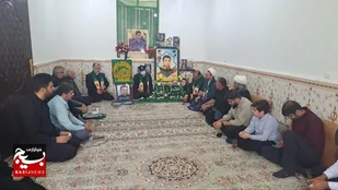 دیدار خادمین حرم رضوی با خانواده شهید امید افراسیابی در شهرستان گتوند