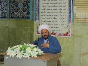 برگزاری مراسم تکریم خانواده بسیج در بویین میاندشت