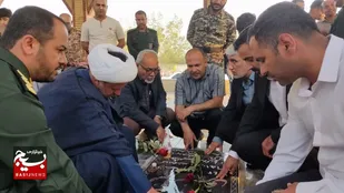 غبار روبی و عطرافشانی مزار شهداء در عسلویه