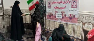 یاد شهید در کوچه&zwnj;های محله؛ تجلیل از خانواده شهید عبدالرحمان چراغ مکان در کمب