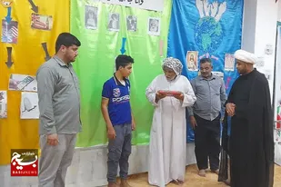 دیدار و تشویق دانش آموز نخبه ی شادگانی