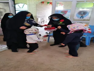 مراسم عطر افشانی و گلباران مزار شهدا به مناسبت ایام الله فجر