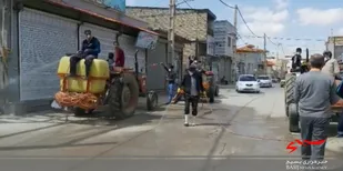 ضدعفونی معابر شهرک ولیعصر همدان به همت جهادگران بسیجی