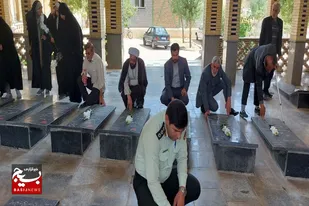 غبارروبی مزار مطهر شهدای لالجین به مناسبت هفته دفاع مقدس