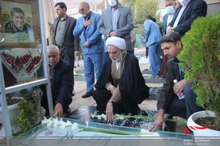 ادای احترام  به شهدا با حضور مدیر کل دادگستری کرمان