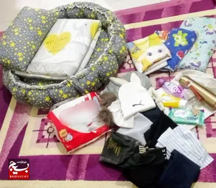 اهدای پنج بسته سیسمونی به خانواده های کم بضاعت در زاهدان