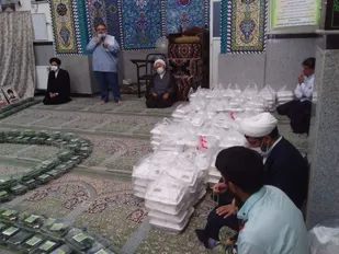 دومین مرحله توزیع غذای گرم به عنوان افطاری بین نیازمندان