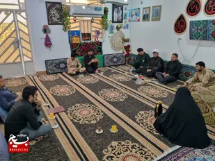 دیدار با خانواده شهید مدافع حرم سجاد باوی در شهرستان کارورن