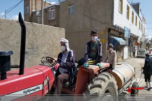 ضدعفونی معابر شهرک ولیعصر همدان به همت جهادگران بسیجی