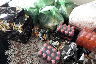 تهیه و توزیع 50 پرس غذای سرد به همراه بسته های یلدایی میان نیازمندان