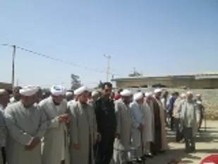 مراسم خاکسپاری مادر شهید دردی محمد حاجیلی دوجی/تصاویر