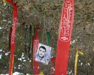 رونمایی از سنگ مزار شهید مدافع حرم محمد اینانلو + عکس