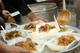 پخت چهل دیگ غذای تبرکی در شاهرود