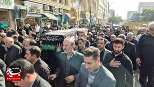 مادر دو شهید در آغوش فرزندانش آرام گرفت