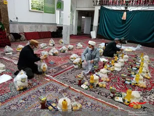 توزیع ۳۰۰ بسته میوه شب یلدا بین نیازمندان شیروان