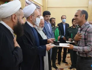 تجلیل از والدین، همسران و فرزندان شهدای شهیدیه میبد