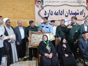 اهدای دو مدال قهرمانی آسیا به خانواده شهدا باحضور سردار آتانی