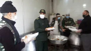 12000پرس غذای گرم بین نیازمندان خوی توزیع شد