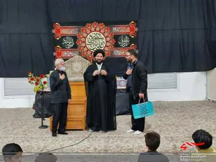 تجلیل از مدیر فروشگاه جانبازان پردیسان در راستای ترویج فرهنگ عفاف و حجاب