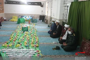 توزیع بسته معیشتی در مراسم شیرخوارگان حسینی شهر اهرم