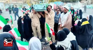 میزبانی دانش آموران در مدرسه حضرت زهرا سلام الله علیها از پیکر شهید گمنام