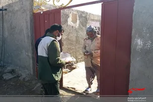 توزیع ۲هزار ماسک توسط بسیجیان در بخش مرکزی هیرمند