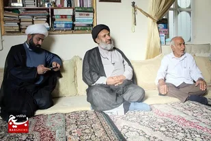 دیدار با خانواده شهید در شهرستان جم